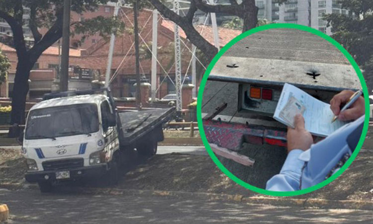 Pillan a grúa de tránsito de Cali cometiendo una infracción, llueven las críticas