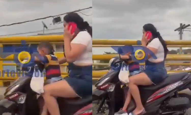 Mujer es grabada mientras conducía su moto con celular en mano